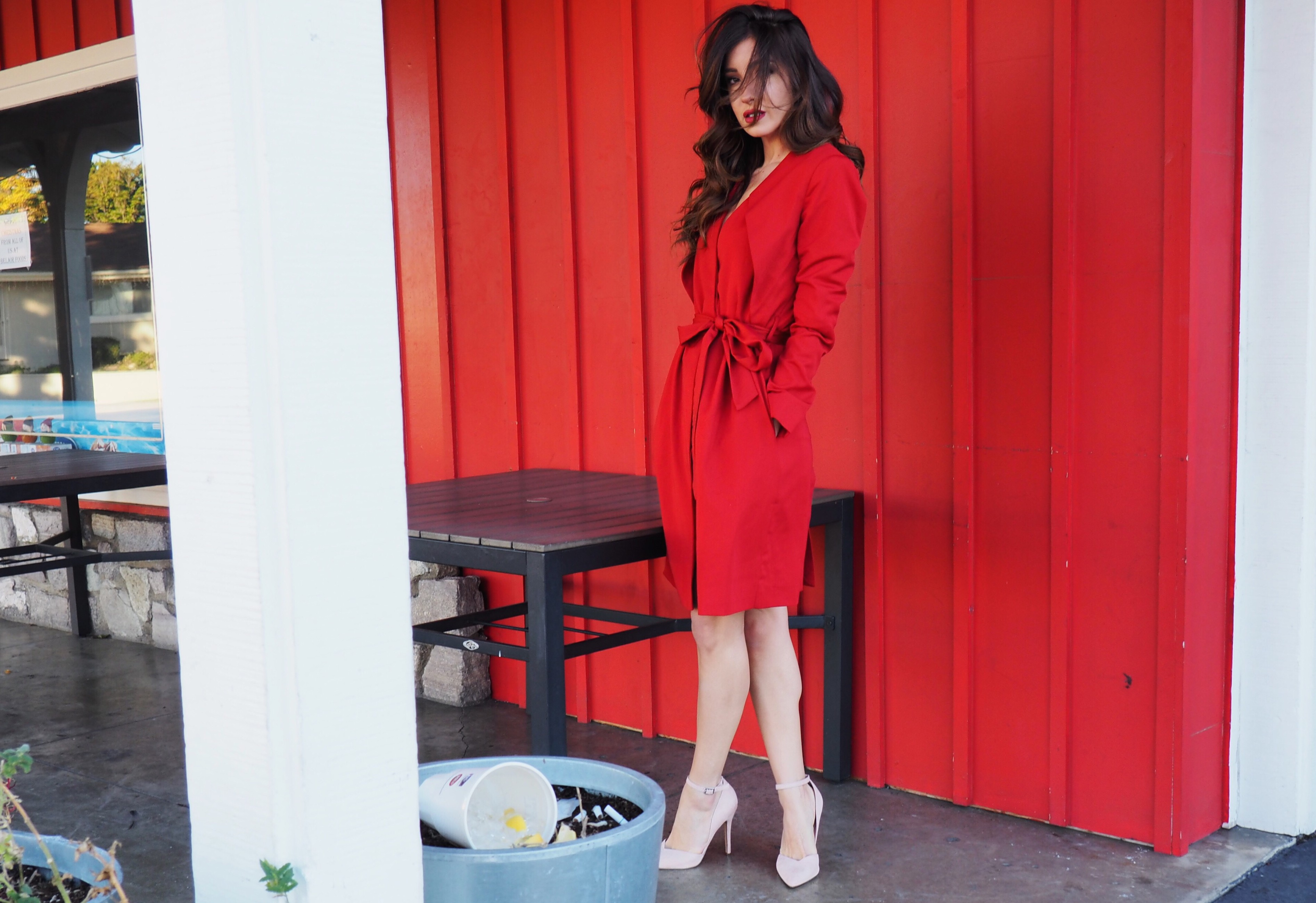 red belted trench coat