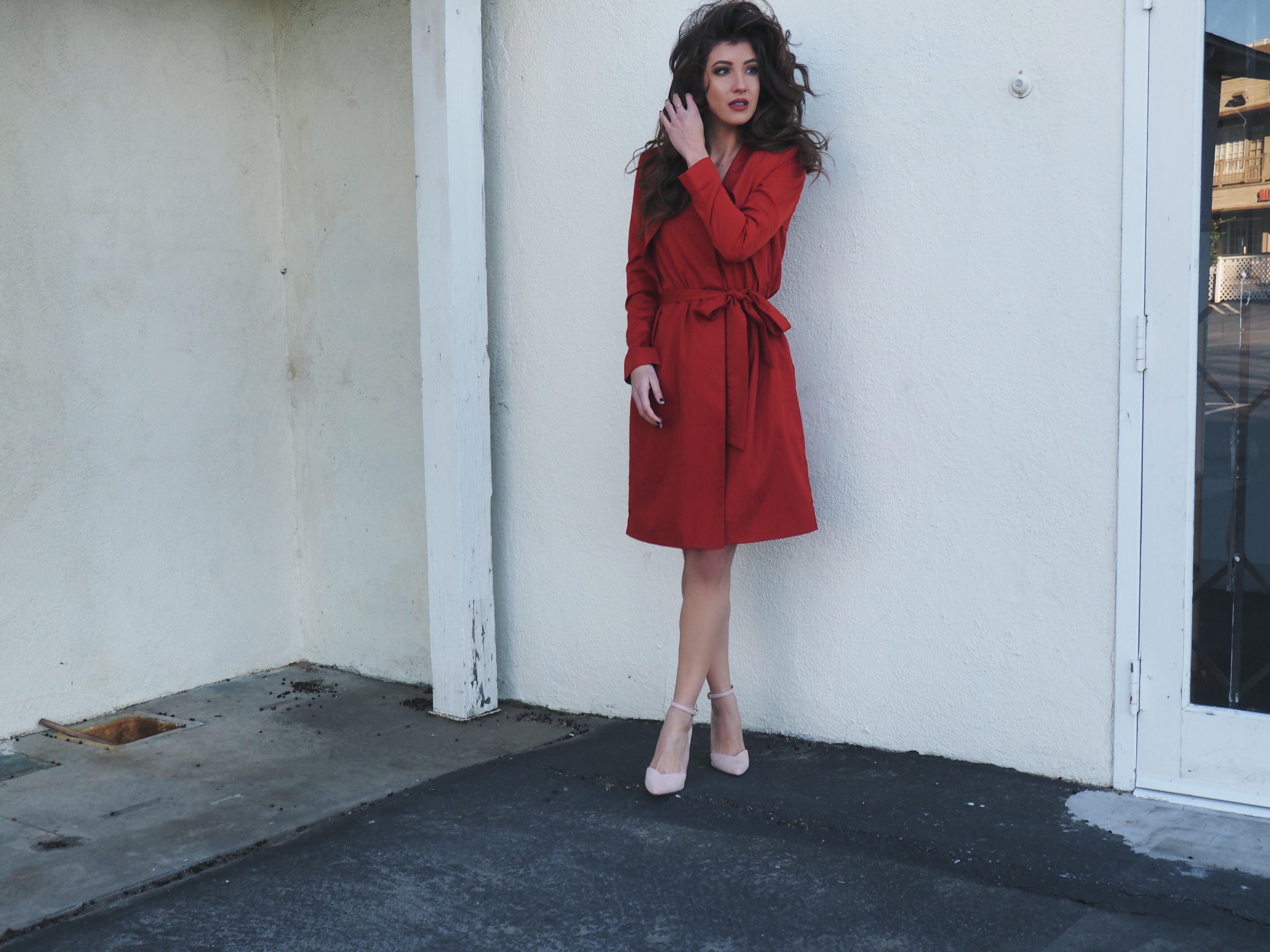 red belted trench coat