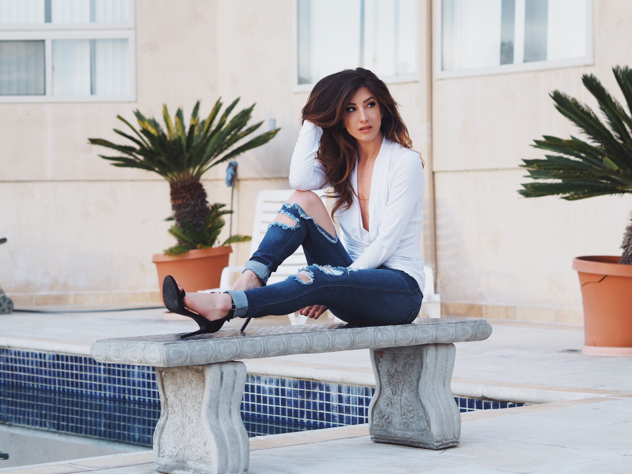 high-waist distressed jeans