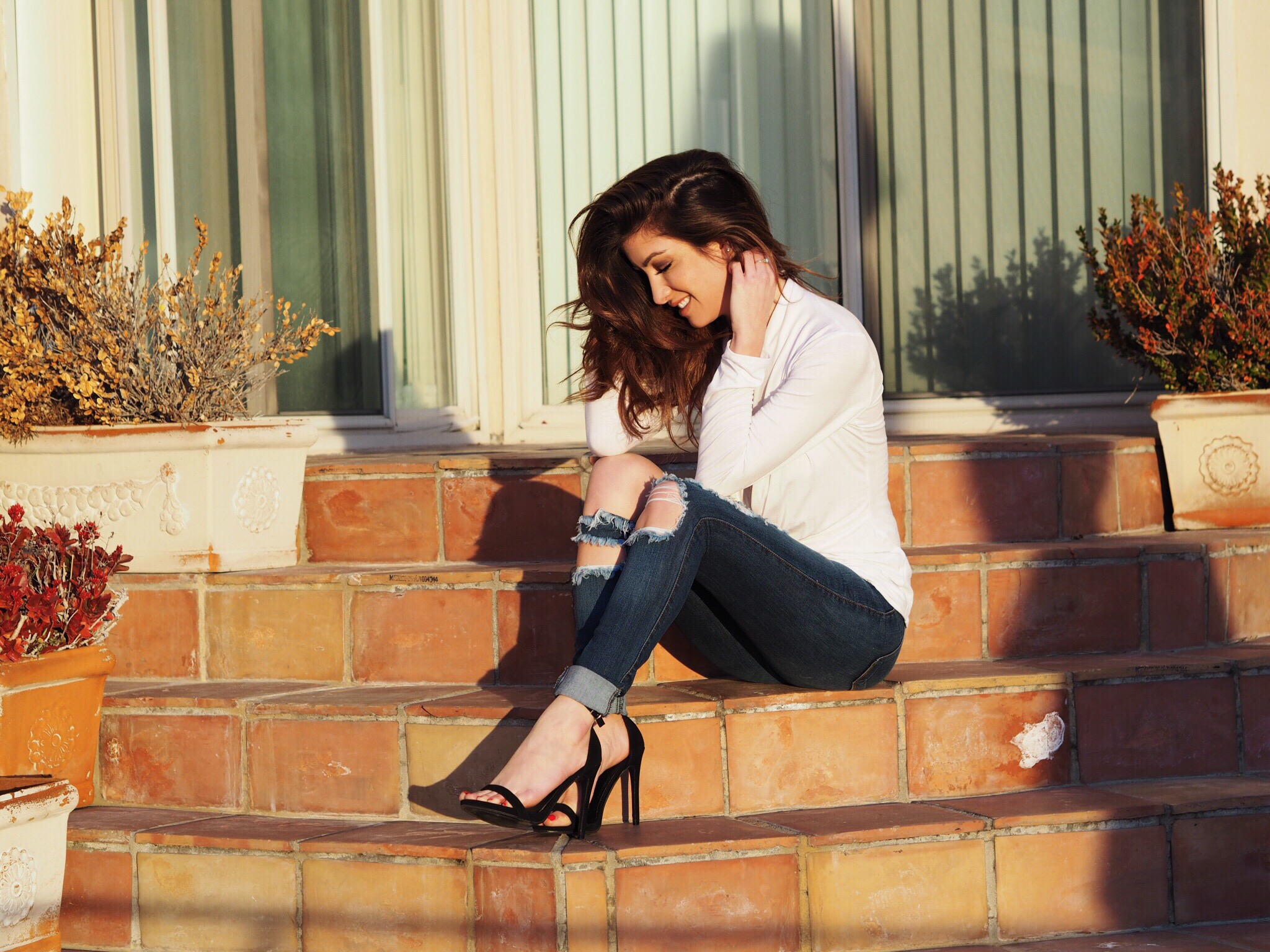high-waist distressed jeans