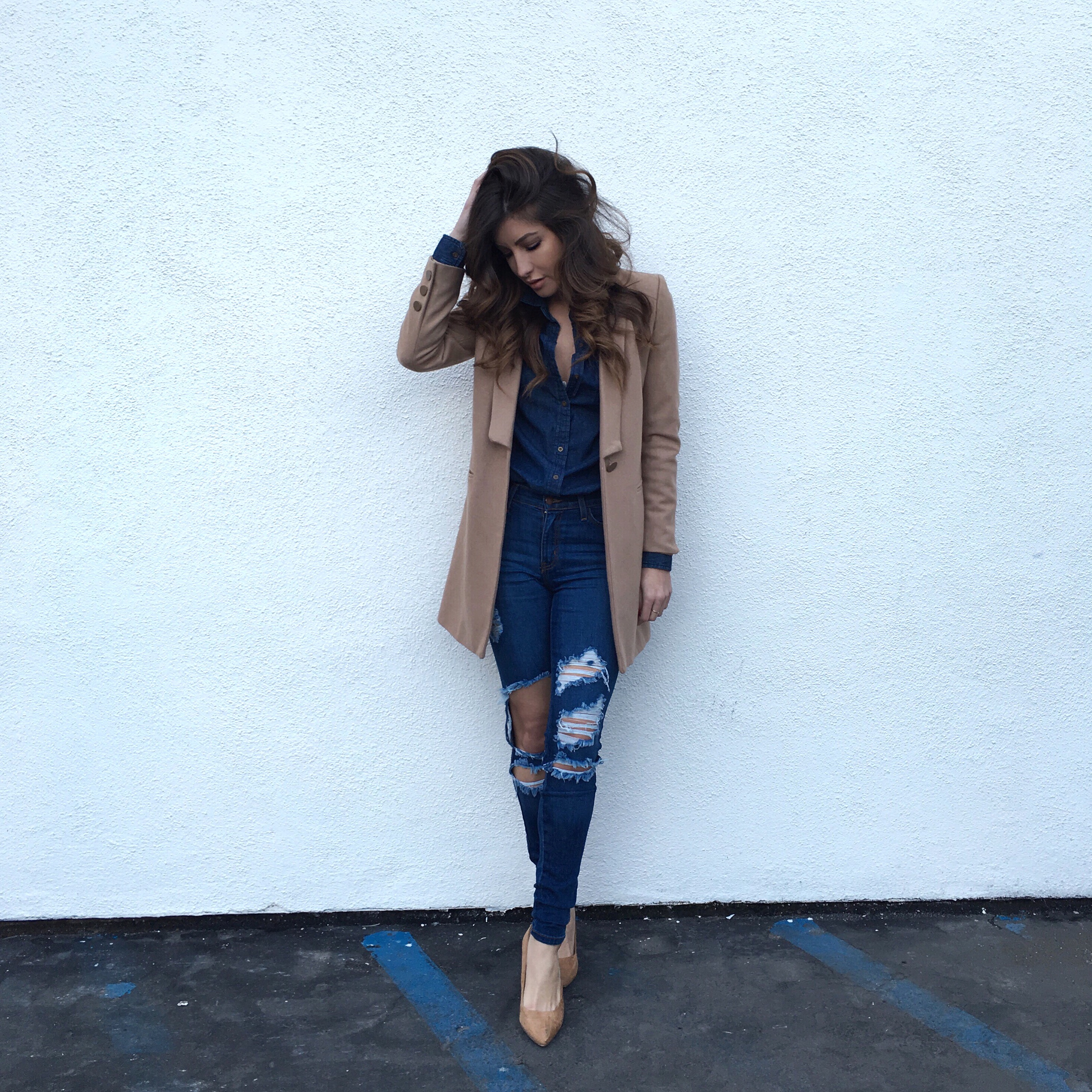 high-waist distressed jeans